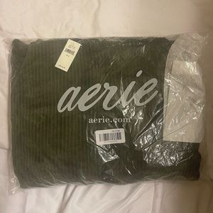 Ribbed velour dark green cropped hoodie.  New in package with tags.